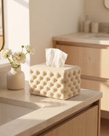Tufted tissue box cover styled on a stone bathroom counter