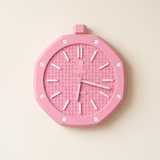 Oversized luxury sport wall clock available for hire, shown against a studio wall