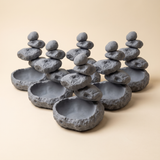 Trade case of six zen stone cairn catchall trays