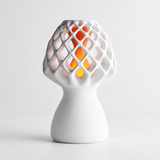 Glow Petal table lamp in White with light puck illuminated